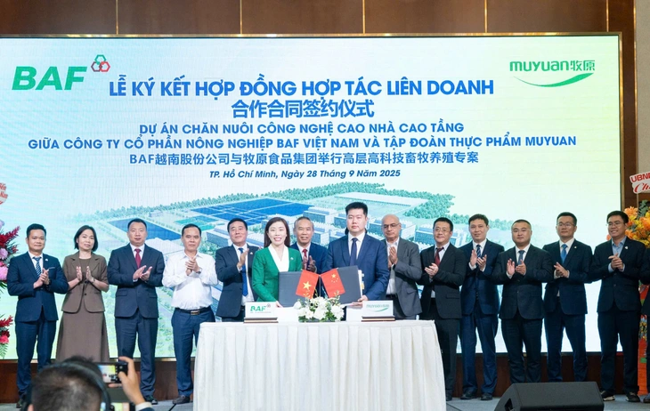 Chính thức ký với đối tác Trung Quốc thực hiện mô hình nuôi heo trong nhà cao tầng- Ảnh 1. Chính thức ký với đối tác Trung Quốc thực hiện mô hình nuôi heo trong nhà cao tầng- Ảnh 1.